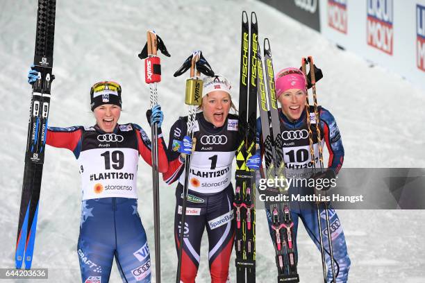 Silver medalist Jessica Diggins of the United States, gold medalist Maiken Caspersen Falla of Norway and bronze medalist Kikkan Randall of the United...