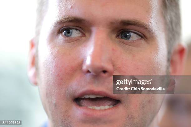 Reporters surround white supremacist Richard Spencer during the first day of the Conservative Political Action Conference at the Gaylord National...