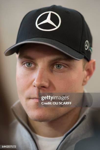 Mercedes AMG Petronas Formula One driver Finland's Valtteri Bottas takes part in the launch event for the Mercedes 2017 Formula one car at...
