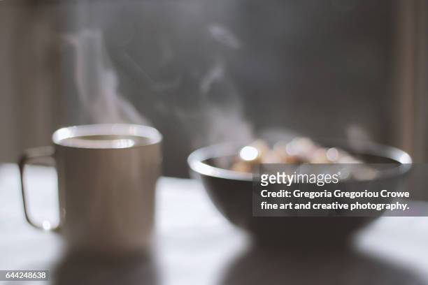 steaming porridge and tea - gregoria gregoriou crowe fine art and creative photography stock pictures, royalty-free photos & images