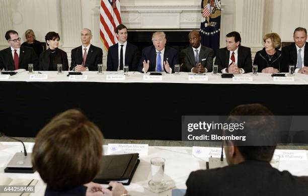 President Donald Trump, center, speaks while Michael Dell, chairman and chief executive officer of Dell Technologies Inc., from left, Phebe...