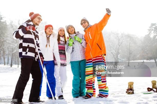 happy friends in snow - casaco de esqui imagens e fotografias de stock