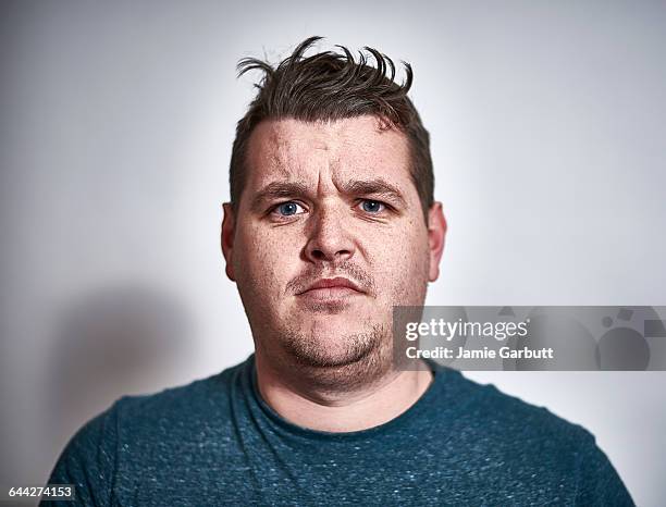 early 30's male with a displeased expression - confusing stock pictures, royalty-free photos & images