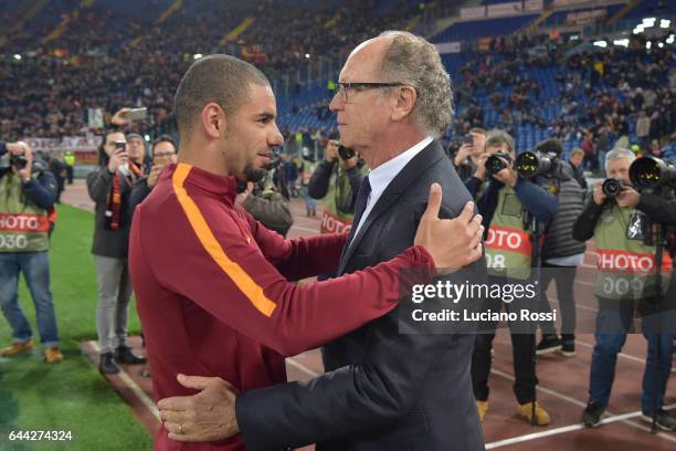 Roma ex player Paolo Roberto Falcao meets his brasilian countryman Bruno Peres before the UEFA Europa League Round of 32 second leg match between AS...