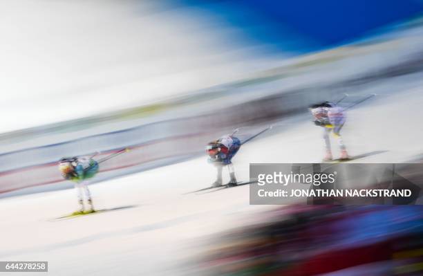 Athletes compete during the Quarterfinal of the Ladies 1.4 km Sprint Classic Finals of the 2017 FIS Nordic World Ski Championships in Lahti, Finland,...