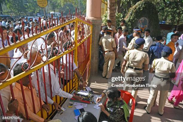 Candidates and other party members wait outside vote counting centre at Bhandup on February 23, 2017 in Mumbai, India. The BJP has won 82 of the...