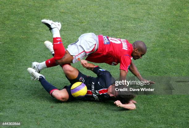 Cristian RODRIGUEZ / Florent MALOUDA - - PSG / Lyon - 35e journee Ligue 1, Photo : Dave Winter / Icon Sport