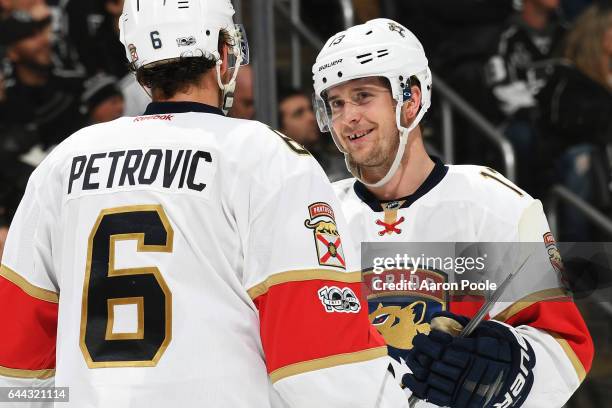 Mark Pysyk of the Florida Panthers chats with teammate Alex Petrovic before a face-off during the game against the Los Angeles Kings on February 18,...