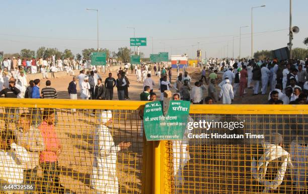 Indian National Lok Dal activists protesting over the Satluj-Yamuna Link canal issue at Shambhu border on February 23, 2017 in Patiala, India. Top...