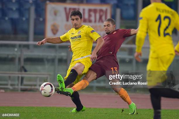 Bruno Peres of AS Roma and Jose Angel of FC Villarreal compete for the ball during the UEFA Europa League Round of 32 second leg match between AS...