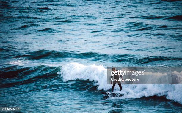 surfing in california. - carlsbad california stock pictures, royalty-free photos & images