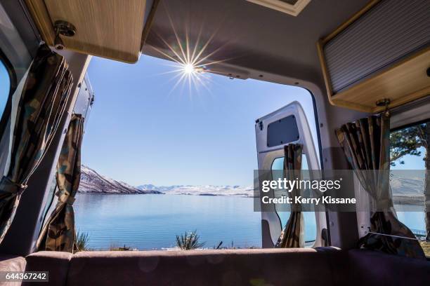 lake tekapo viewed from camper van - motorhome winter stock-fotos und bilder