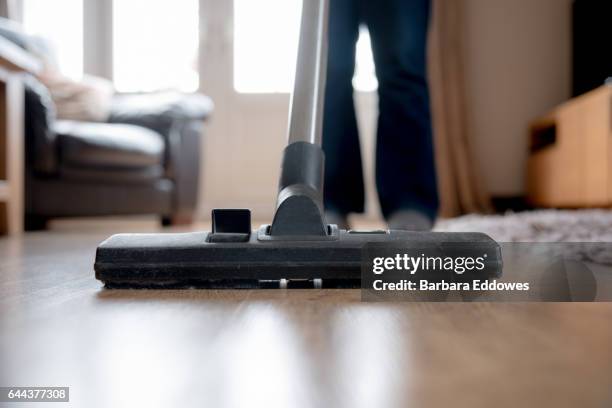 it's a chore - wooden floor low angle stock pictures, royalty-free photos & images