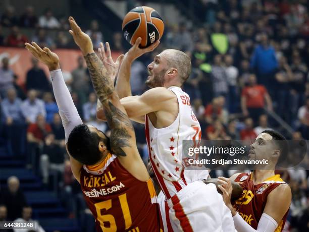 Marko Simonovic of Crvena Zvezda in action against Goksenin Koksal and Austin Daye of Galatasaray during the 2016/2017 Turkish Airlines EuroLeague...