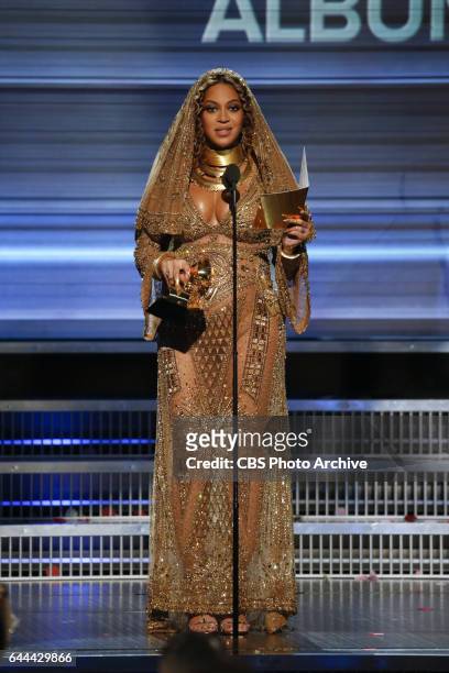 Beyonce accepts the Grammy Award for Best Urban Contemporary Album during THE 59TH ANNUAL GRAMMY AWARDS, broadcast live from the STAPLES Center in...