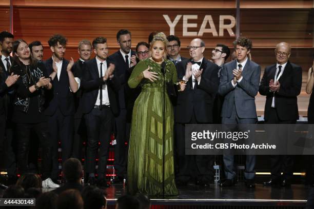 Adele accepts the Grammy Award for Album of the Year during THE 59TH ANNUAL GRAMMY AWARDS, broadcast live from the STAPLES Center in Los Angeles,...