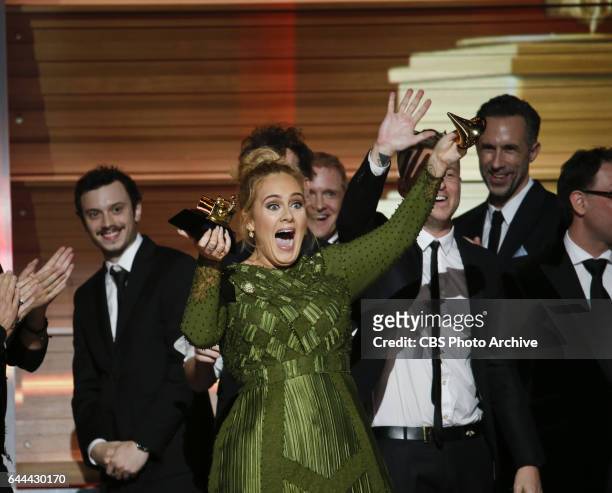 Adele accepts the Grammy Award for Album of the Year during THE 59TH ANNUAL GRAMMY AWARDS, broadcast live from the STAPLES Center in Los Angeles,...