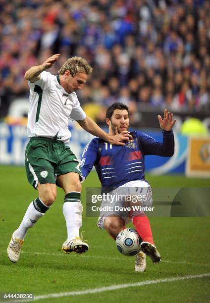 Andre Pierre GIGNAC / Liam LAWRENCE - - France / Eire - Barrage retour - Qualifications Coupe du Monde 2010 - Stade de France - Saint Denis, Photo :...