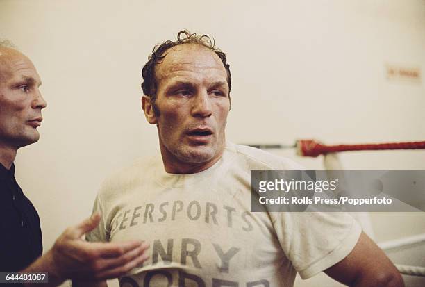 English heavyweight boxer Henry Cooper pictured in training with his brother George Cooper in London in October 1970 prior to his fight with Jose...