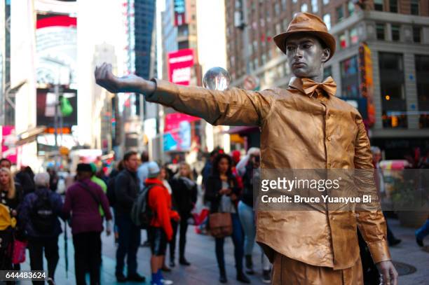 a street performer in times square - nyc bodypainting day stock pictures, royalty-free photos & images