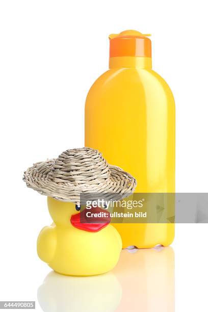 Flasche Sonnenmilch und Gummiente