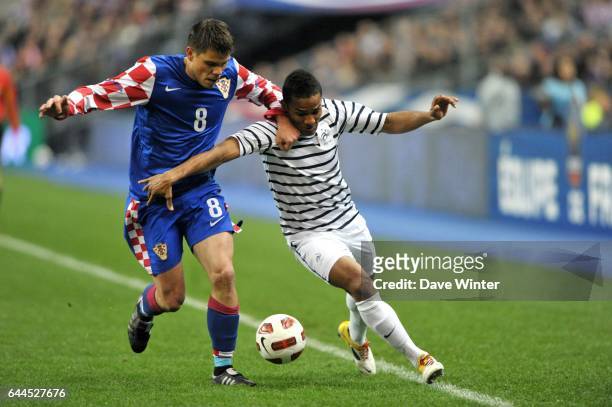 Ognjen VUKOJEVIC / Florent MALOUDA - - France / Croatie - Match amical -Stade de France, Photo : Dave Winter / Icon Sport