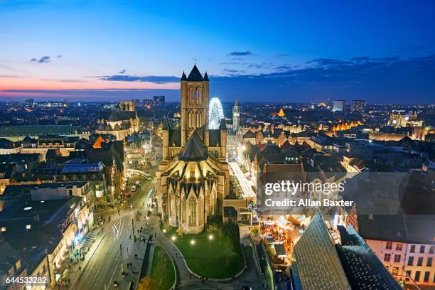 aerial view of the medieval st nicholas church in ghent at night - national day of belgium 2016 imagens e fotografias de stock