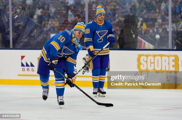 Scottie Upshall and Ty Rattie of the St. Louis Blues warm up prior to the 2017 Bridgestone NHL Winter Classic against the Chicago Blackhawks at Busch...