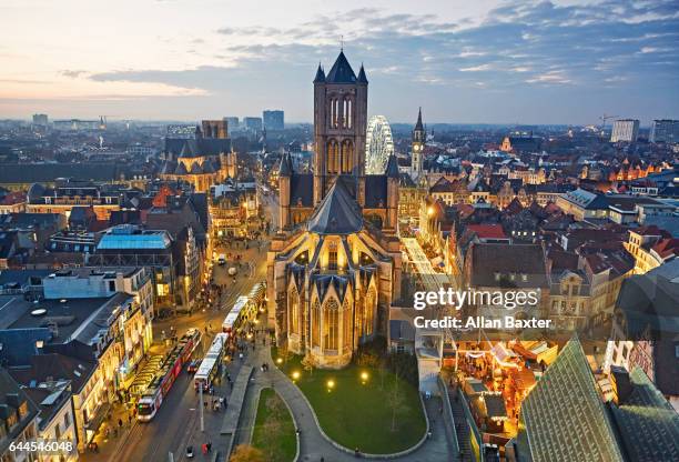 aerial view of the medieval st nicholas church in ghent at dusk - belgium christmas stock pictures, royalty-free photos & images