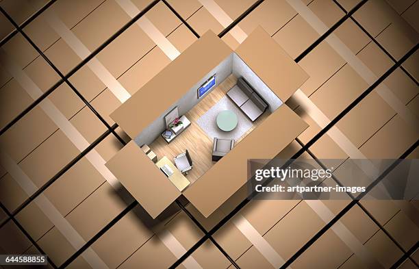 cardboard box filled with furniture - small stock-fotos und bilder