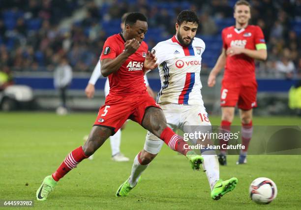 Ridgeciano Haps of AZ Alkmaar and Nabil Fekir of Lyon in action during the UEFA Europa League Round of 32 second leg match between Olympique Lyonnais...