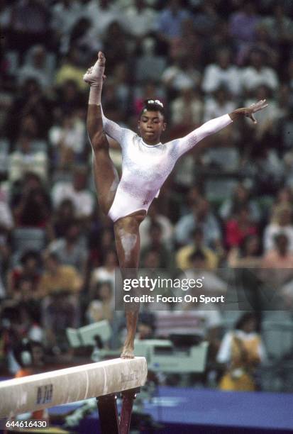 Gymnast Dominique Dawes of the United States competes on the Balance Beam during the Games of the XXV Olympiad in the 1992 Summer Olympics circa 1992...