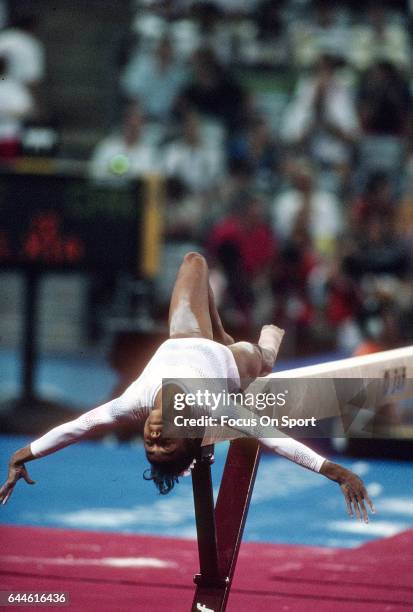 Gymnast Dominique Dawes of the United States competes on the Balance Beam during the Games of the XXV Olympiad in the 1992 Summer Olympics circa 1992...