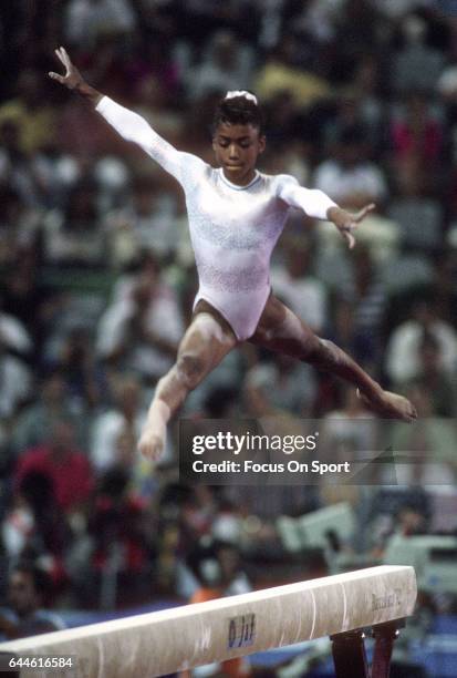 Gymnast Dominique Dawes of the United States competes on the Balance Beam during the Games of the XXV Olympiad in the 1992 Summer Olympics circa 1992...