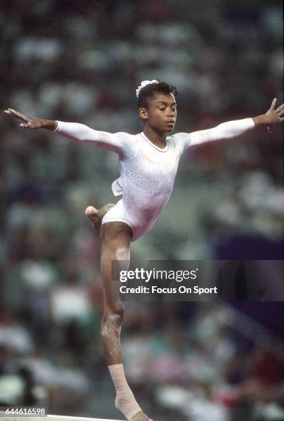 Gymnast Dominique Dawes of the United States competes on the Balance Beam during the Games of the XXV Olympiad in the 1992 Summer Olympics circa 1992...