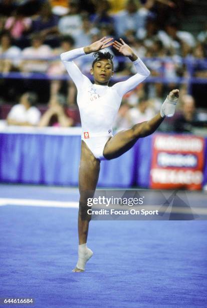 Gymnast Dominique Dawes of the United States competes in the Floor exercise during the 1992 Olympic Trials at the Baltimore Arena in Baltimore,...