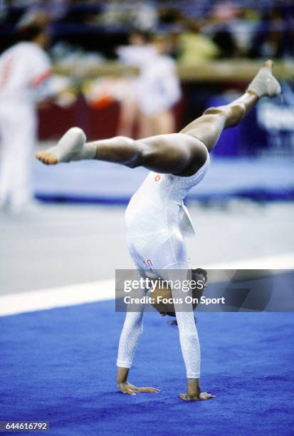 Gymnast Dominique Dawes of the United States competes in the Floor exercise during the 1992 Olympic Trials at the Baltimore Arena in Baltimore,...