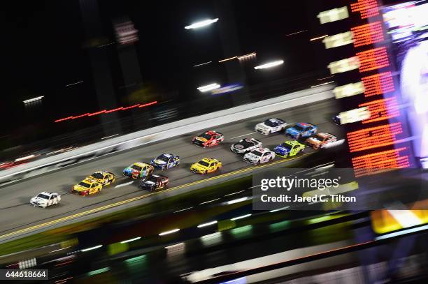 Brad Keselowski, driver of the Miller Lite Ford, leads a pack of cars during the Monster Energy NASCAR Cup Series Can-Am Duel 1 at Daytona...