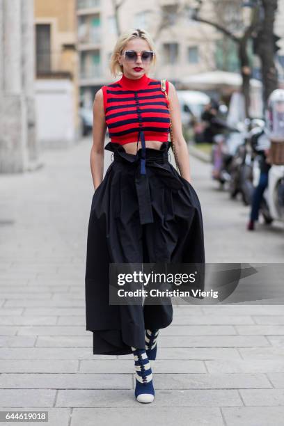 Caroline Vreeland wearing a red black striped cropped top, wide leg pants outside Fendi during Milan Fashion Week Fall/Winter 2017/18 on February 23,...