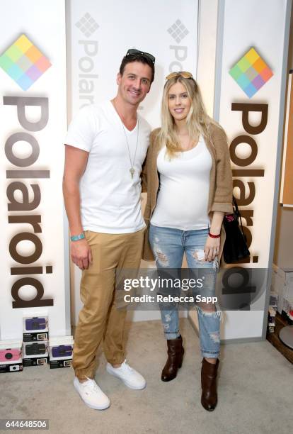 Olympic athlete Ryan Lochte and Kayla Rae Reid attend Kari Feinstein's Pre-Oscar Style Lounge at the Andaz Hotel on February 23, 2017 in Los Angeles,...