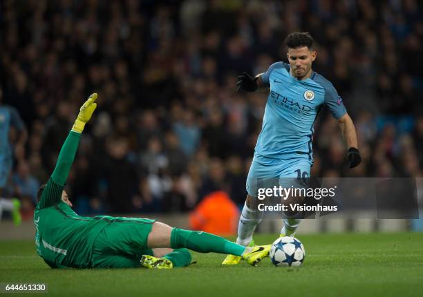 Sergio Aguero of Manchester City is brought down by Danijel Subasic of AS Monaco but is booked for diving during the UEFA Champions League Round of...