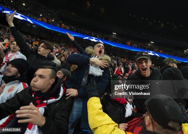 Monaco fans celebrate a goal during the UEFA Champions League Round of 16 first leg match between Manchester City FC and AS Monaco at Etihad Stadium...