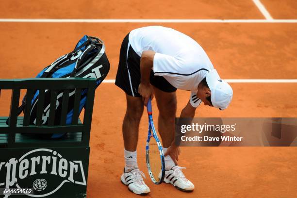 Nicolas LAPENTTI blesse - - Roland Garros 2009 , Photo : Dave Winter / Icon Sport