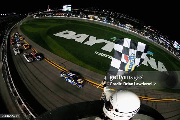 Chase Elliott, driver of the NAPA Chevrolet, takes the checkered flag to win the Monster Energy NASCAR Cup Series Can-Am Duel 1 at Daytona...