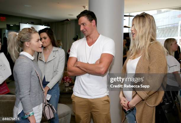 Actor Witney Carson, Olympic athlete Ryan Lochte and model Kayla Rae Reid attend Kari Feinstein's Pre-Oscar Style Lounge at the Andaz Hotel on...