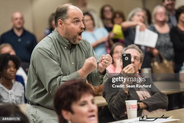 Byron Navey, of Florence, SC, voices his concerns during a town hall meeting with U.S. Rep. Tom Rice at the Florence County Library on February 23,...