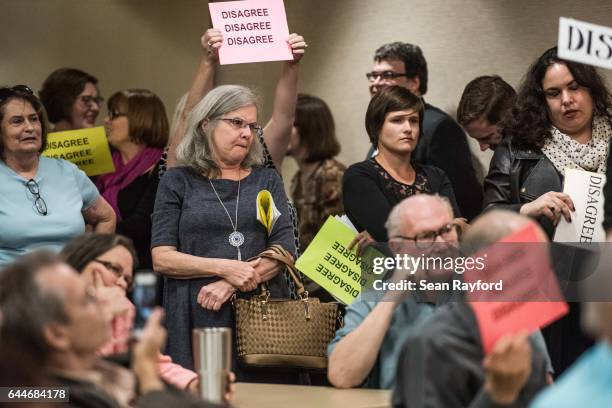 Constituents react during a town hall meeting with U.S. Rep. Tom Rice at the Florence County Library on February 23, 2017 in Florence, South...