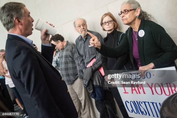 Jean Grosser of Hartsville, Soth Carolina talks with U.S. Rep. Tom Rice before a town hall meeting at the Florence County Library on February 23,...