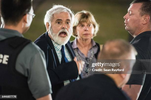 Man argues with law enforcement outside of a town hall meeting with U.S. Rep. Tom Rice at the Florence County Library on February 23, 2017 in...