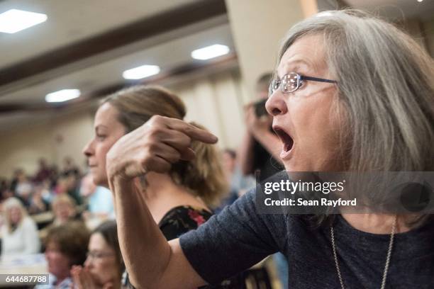 Delia Blintz, of Florence, SC, voices her concerns during a town hall meeting with U.S. Rep. Tom Rice at the Florence County Library on February 23,...